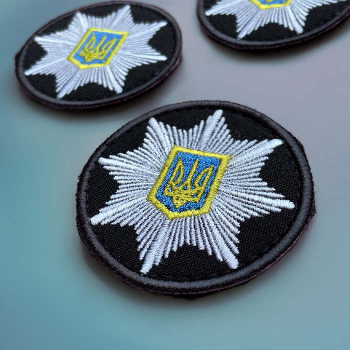Кокарда Поліція кругла 6 см на липучці чорна (тип 2)